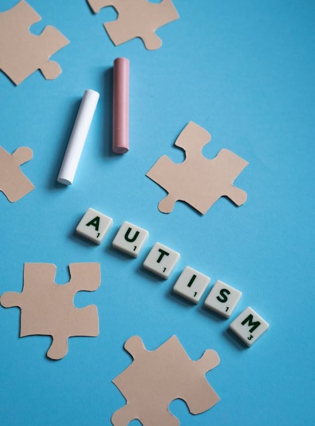 White Scrabble Tiles on Blue Background