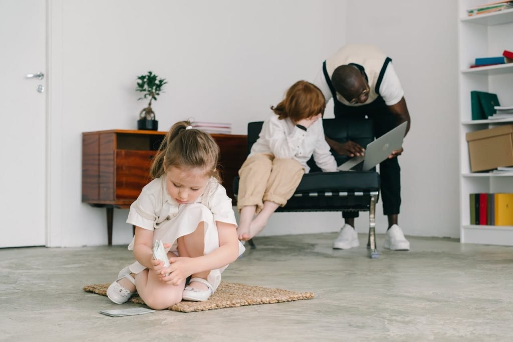 Young girl engaged in play therapy with psychologists guidance indoors.